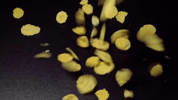 Falling Corn Flakes on a Black Background