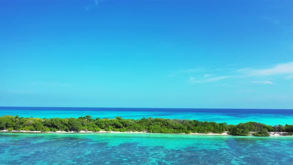 Luxury overhead clean view of a white sandy paradise beach and turquoise sea background in high reso