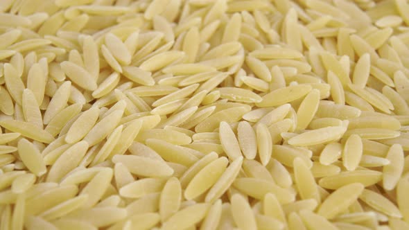 Raw peeled whole barley seeds close up