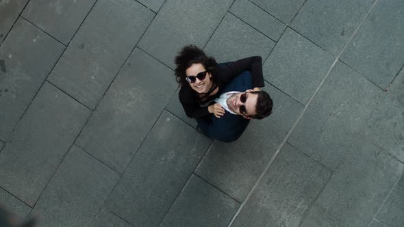 Top View Couple Hugging at Street. Business Couple Smiling Together Outside