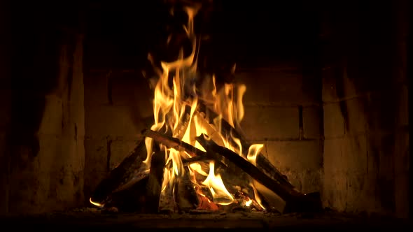 Burning Fire In The Fireplace Slow Motion A Looping Clip of a Fireplace with Medium Size 