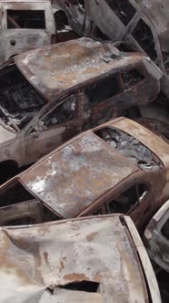 Vertical Video of a Dump of Destroyed Cars During the War in Ukraine