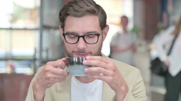 Man Drinking Coffee