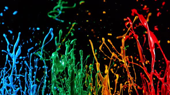 Colorful Splashing Paint in Super Slow Motion. Shot with High Speed Cinema Camera at 1000Fps