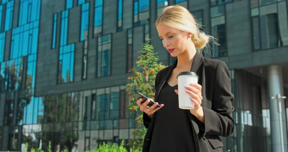 Beautiful Woman Going To Work With Coffee Walking Near Office Building Portrait Of Successful