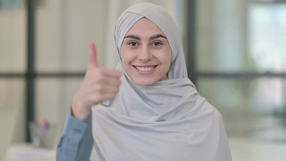 Young Arab Woman Showing Thumbs Up Sign