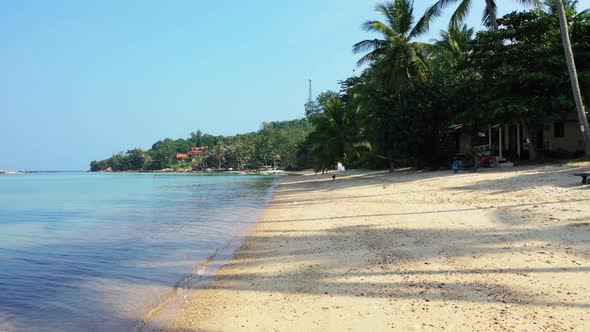 Aerial view travel of idyllic seashore beach holiday by clear water with white sandy background of j