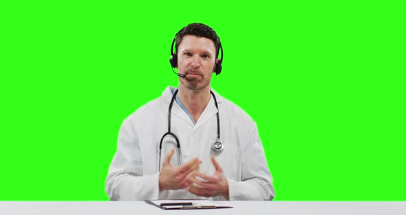 Caucasian male doctor on green screen background