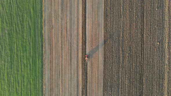 Tractor Plowing Fields Preparing Land for Sowing