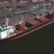 Loading Grain Onto a Cargo Ship for Transportation By Sea By a Conveyor Belt Machine - VideoHive Item for Sale