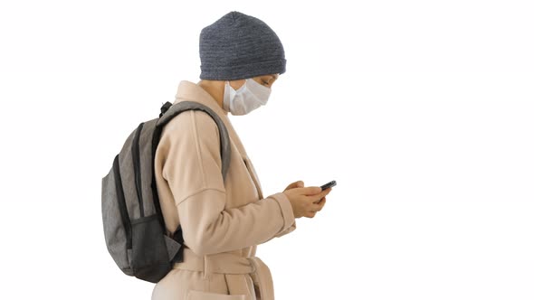 Female Wearing Medical Mask Walking on White Background