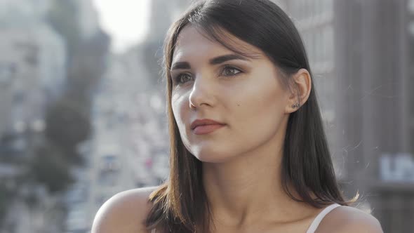 Beautiful Woman Looking Away While Waiting Someone To Meet in the City