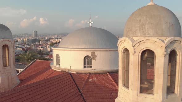 Aerial 4K Drone footage of the Church of the holy trinity at sunset in limassol, Cyprus