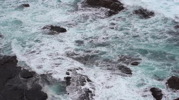 Video footage of beautiful blue ocean waves crashing the rocky shore at Loch Ard Gorge 12 Apostles C