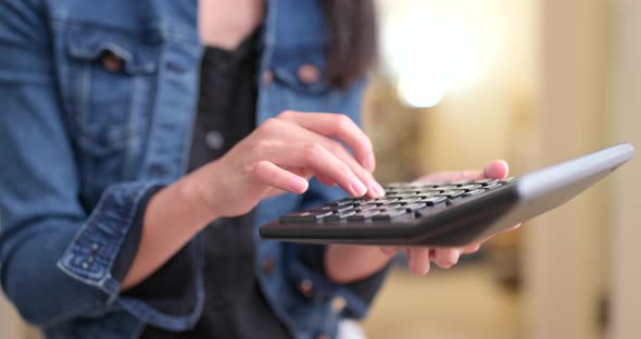 Woman use of calculator