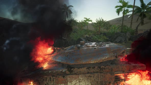 Burned Tank in the Desert at Sunset