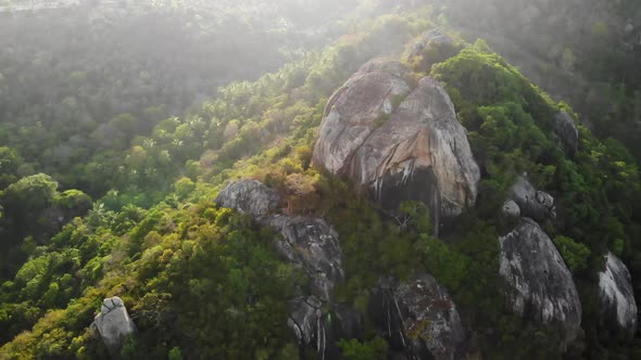 Jungles and Mountains of Tropical Island. Drone View of Green Jungles and Huge Boulders