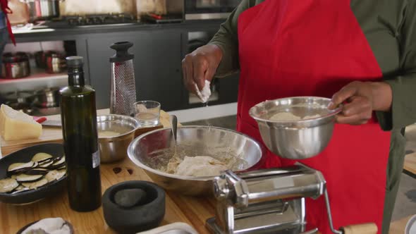 Chef adding more flour