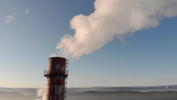 Dirty Smoke Pours Out of Chimneys Into the Air