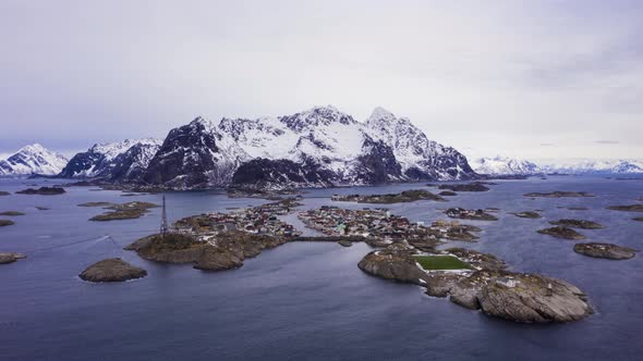 Henningsvaer Village and Mountains in Winter. Lofoten, Norway. Aerial View