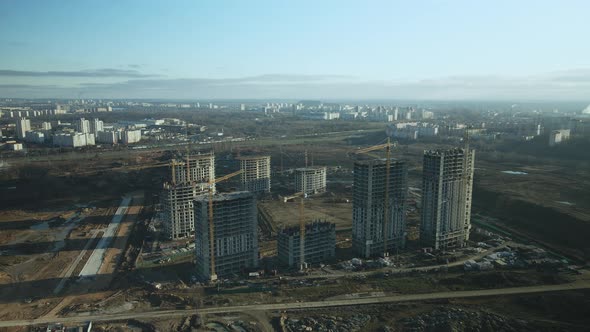 The border between old and new buildings. Construction site.