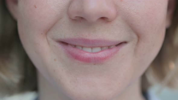 Close Up of Smiling Mouth of Woman