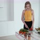 Young Woman Slicing Red Pepper For Vegetable Salad. - VideoHive Item for Sale