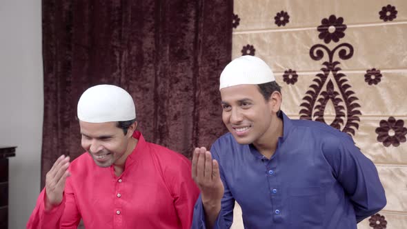 Muslim men greeting by doing Adaab