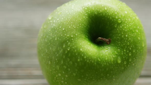 Green Apple with Water Drops