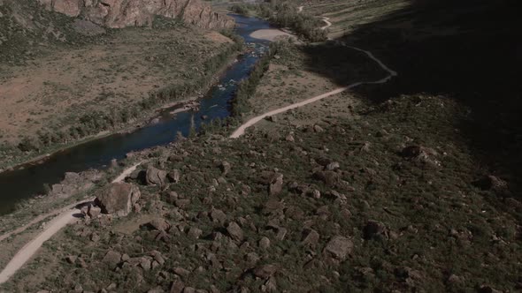 River Chulyshman between mountains with blue clear sky in Altai