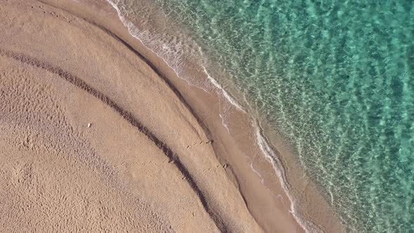 Aerial View of Tropical Sandy Beach and Ocean with Crystal Blue Water