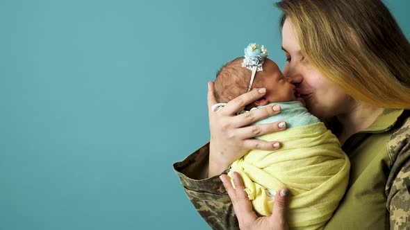 Ukrainian Military Woman with Baby