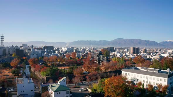 Aerial View 4k footage of Matsumoto Castle on morning in Matsumoto city.