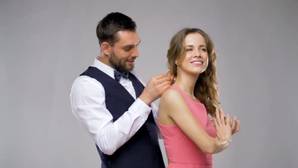 Happy Man Giving Diamond Necklace To Woman 8