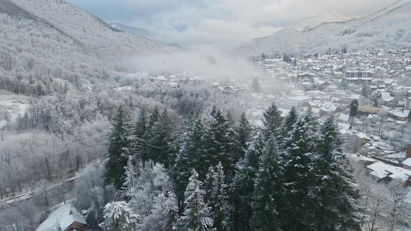 Krasnaya Polyana Village Surrounded By Mountains Covered with Snow