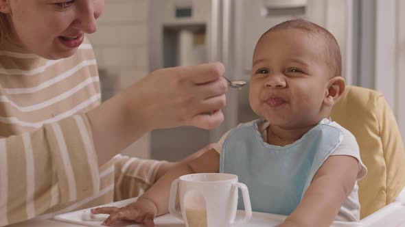 Feeding Child with Baby Food