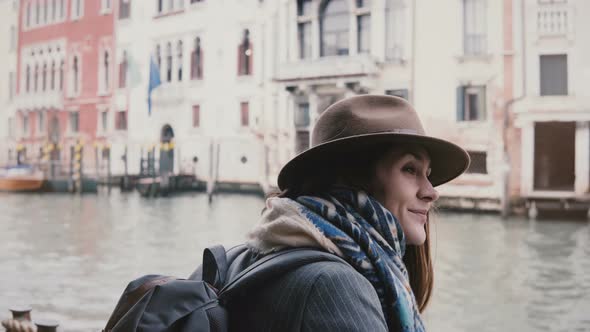 Beautiful Relaxed European Tourist Girl Looking at Camera, Smiling on Amazing Gondola Excursion Tour