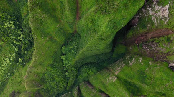 Travel in Na Pali Coast State Park. Aerial View Over the Green Surface of Hawaiian Cliffs