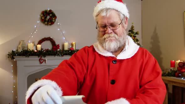 Santa claus reading a list