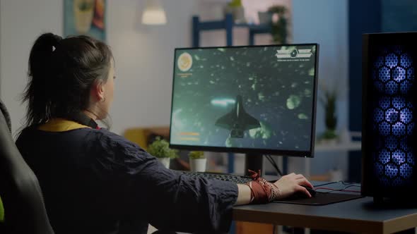 Woman Gamer with Headset Looking at Camera Smiling