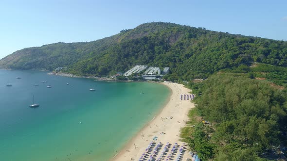 Aerial view drone camera of Beautiful tropical sea sandy beach and waves crashing against sand beach