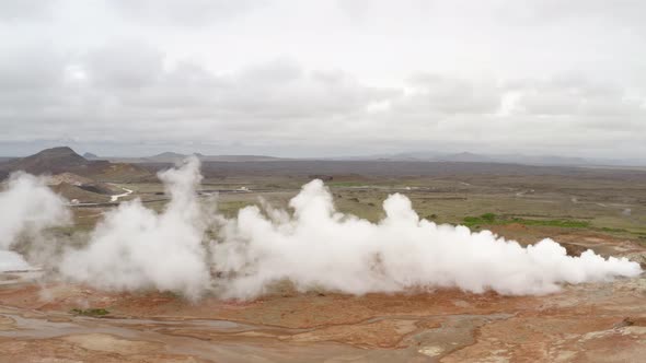 Steaming Mud Holes And Solfataras In The Geothermal Area In Iceland - aerial drone shot