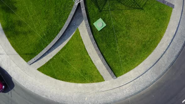 Circular Movement At The Traffic Intersection. Aerial view of roundabout in the city in the summer