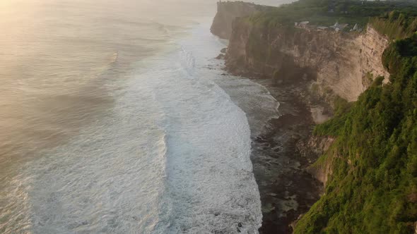 Uluwatu Cliff Aerial Footage, Bali, Indonesia. Camera Moves Along the Cliff
