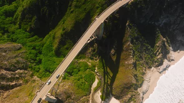 Soaring Over Long Stretch of Ocean View Highway in Middle of Green Canyon USA