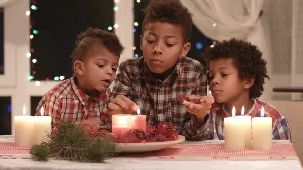 Black Boys Light Christmas Candles