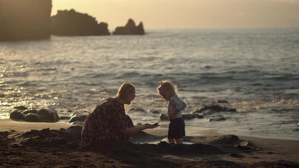 Having Great Time with Beloved Daughter. Fun on the Beach