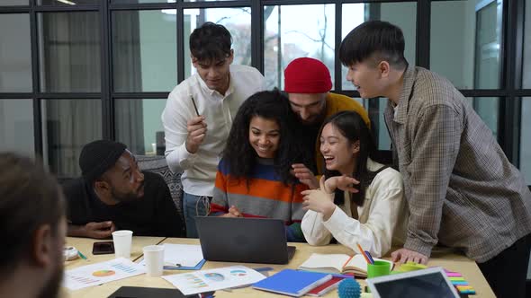 Joyful Diverse Colleagues During Video Conference