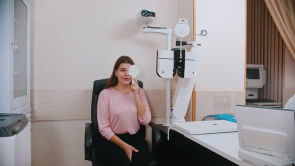 Young Woman Checking Her Visual Acuity