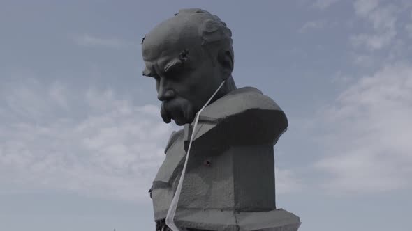 Damaged Monument to Shevchenko During the War in Ukraine